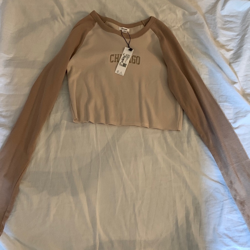 Garage size small, tan Chicago cropped long sleeve